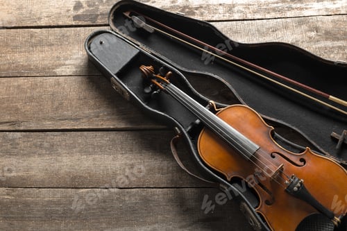Preview: Violin on a wooden textured table