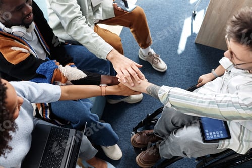 Preview: Colleagues working in team in office