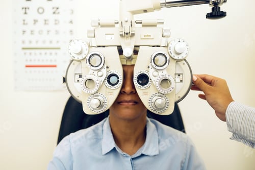 Preview: Woman, eye exam and phoropter with optometrist hand, check and lens for vision, wellness and health