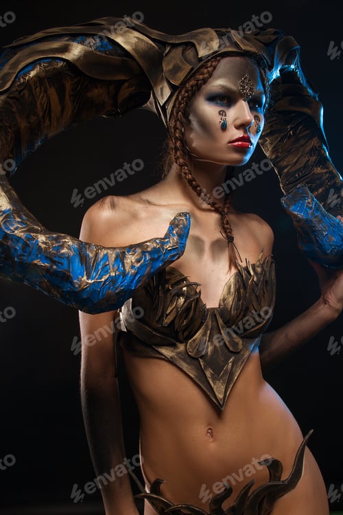Preview: Beautiful Slender Girl In A Suit With Horns For Halloween On A Black Background