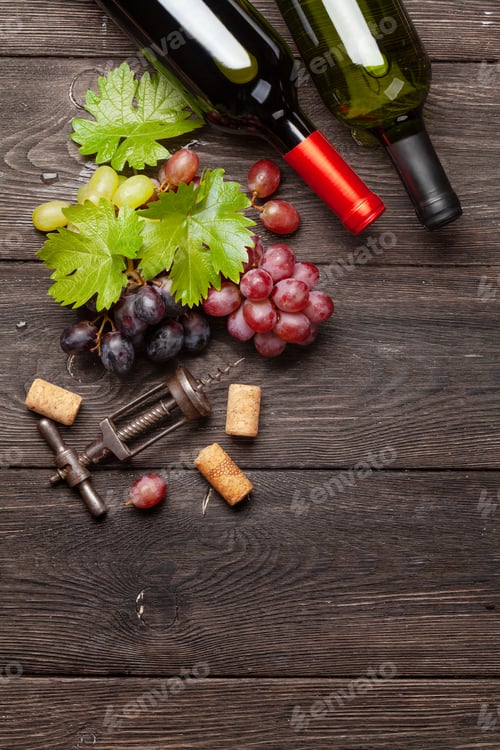 Preview: Various grapes, wine bottles and corkscrew