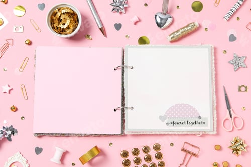 Preview: Scrapbooking, on a pink background, top view.