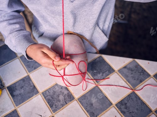 Preview: Elderly person sewing natural sausage