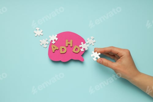 Preview: Paper brains with letters and puzzles on a blue background