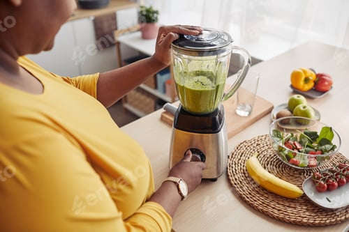 Preview: Woman Making Smoothie