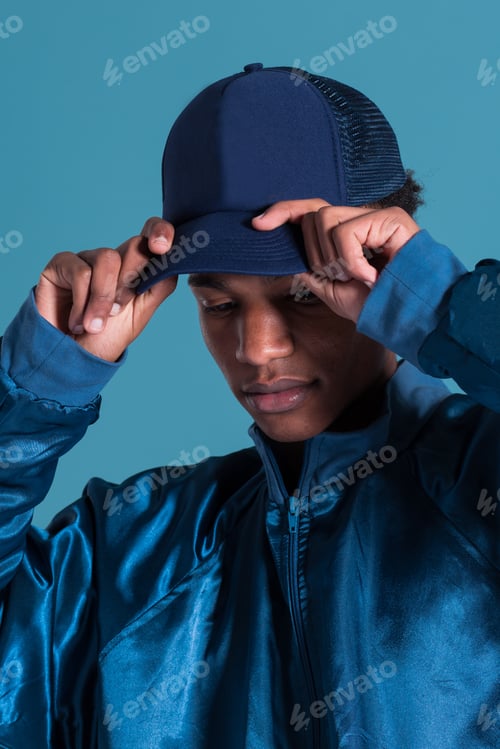 Preview: Anonymous black man in blue outfit