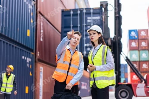 Preview: Caucasian business man and woman worker working in container terminal.
