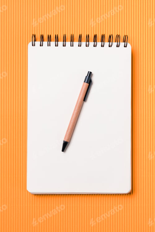 Preview: Spiral notebook on a orange background