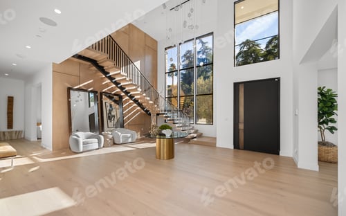 Preview: a very big nice looking living room with wooden floors and staircases