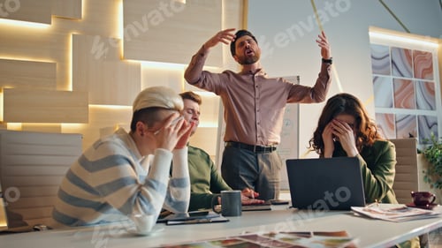 Preview: Stressed team disappointed work results in coworking place. Group business fail