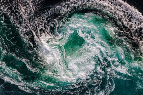 Preview: Blue waves of water of the river and the sea meet each other during high tide and low tide.