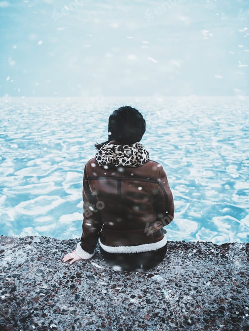 Preview: Sitting on pier above frozen sea