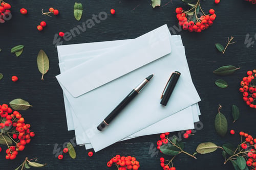 Preview: Flat lay blank envelope and pen mock up copy space