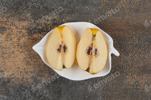 Preview: Two slices of quince on leaf shaped plate