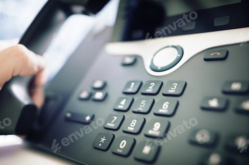 Preview: Dialing a telephone in the office