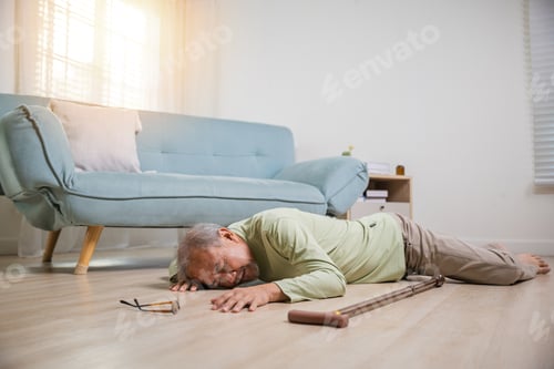 Preview: Elder man falling on the floor alone with walking stick on living room at home