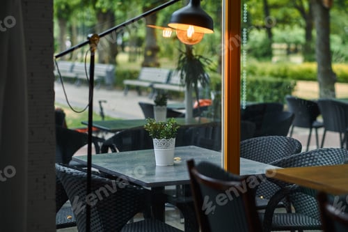 Preview: Empty outdoor cafe. Tables and chairs at restaurant terrace.