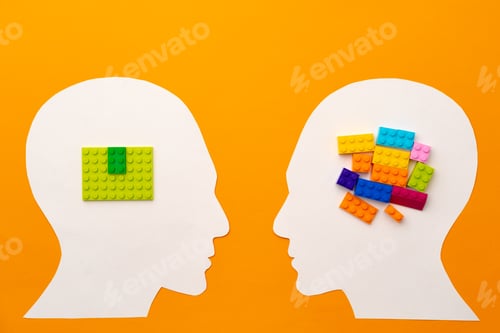 Preview: Papercut head silhouette with toy constructor pieces on yellow background