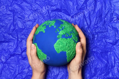Preview: Hands with handmade Earth model
