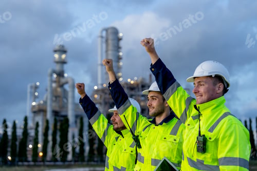 Preview: Factory engineer or technician workers stand in the row and look to left side with raise hands up