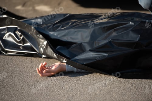 Preview: close-up view of corpse on road after traffic collision