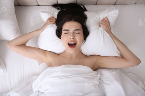 Preview: Young woman having orgasm in bed, top view