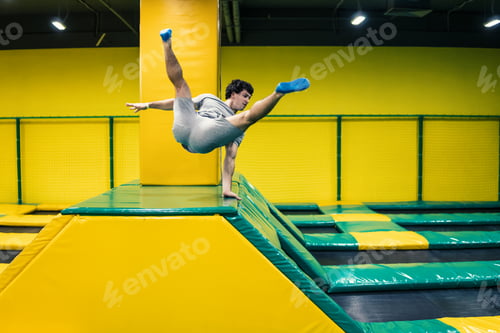 Preview: trampoline jumper performs acrobatic exercises on the trampoline