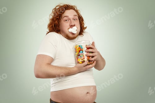 Preview: Obesity, gluttony, people and unhealthy lifestyle. Funny fat obese redhead man in white t-shirt, his