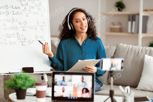 Preview: Young teacher showing board, giving virtual lecture to students