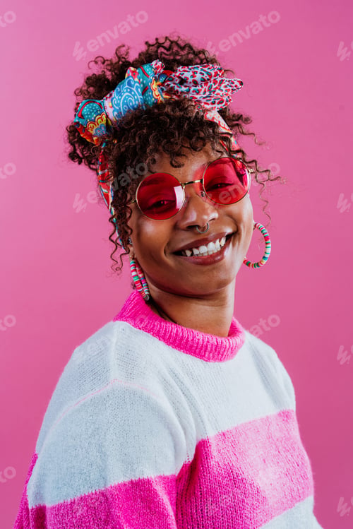 Preview: Young stylish woman smiling wearing colorful clothes and accessories