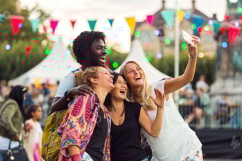Preview: Friends taking selfie at music concert