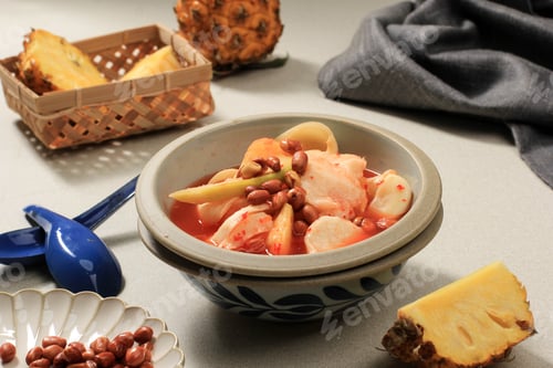 Preview: Asinan Bogor. Popular fruit pickles with peanuts and noodle crackers from Bogor, West Java.