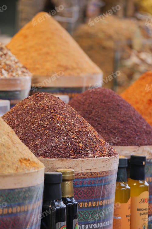 Preview: Spices in containers at a market in the afternoon