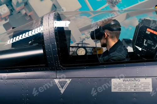 Preview: boy sitting in flight simulator military plane wearing virtual reality glasses flight entertainment
