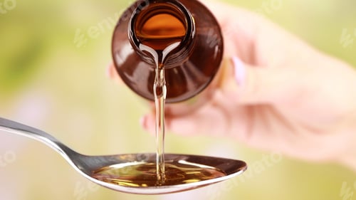 Preview: pouring syrup, medicine, vitamin