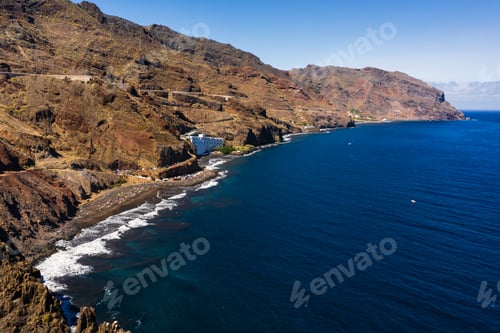 Preview: Rough rocky cliffs in the North of Tenerife.Black beach in the Canary Islands. Rocks, volcanic rocks