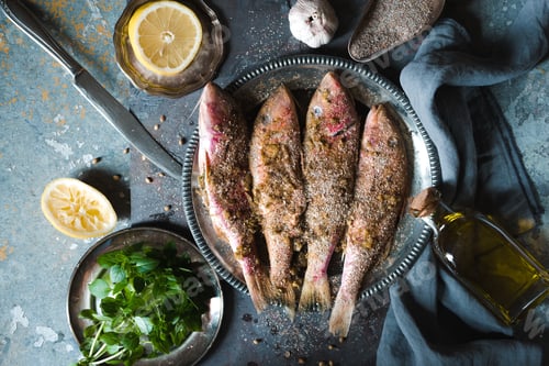Preview: Fried mullet in breaded on a tin plate