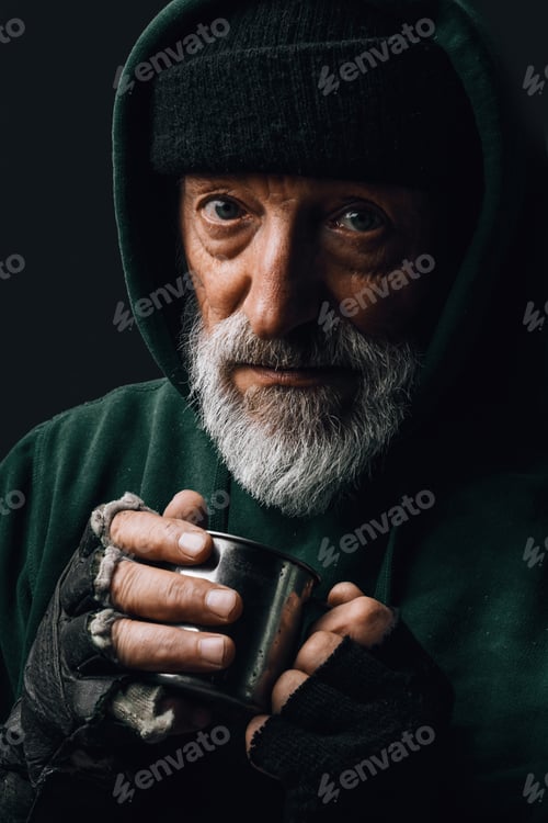 Preview: Elderly beggar being frozen outside, drinking hot water to get warm. Homeless.