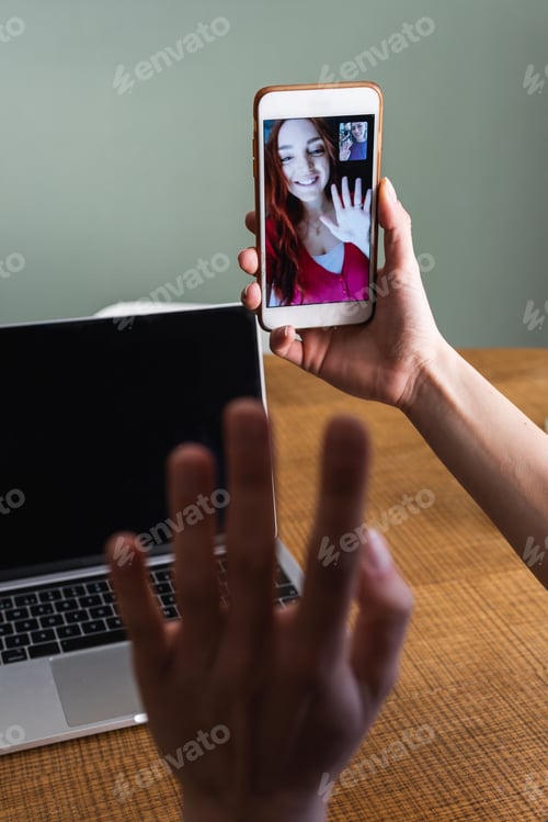 Preview: Crop woman having video call via smartphone