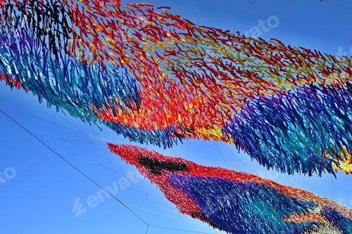 Preview: Festive Abstract Tinsel Closeup From Color Tapes Of Fabric Or From Textile Material Against The