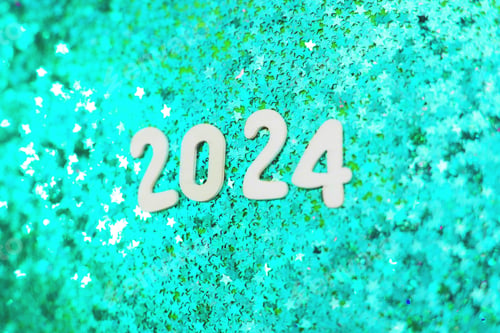 Preview: wooden number 2024 on christmas shiny blue background with sparkle festive confetti
