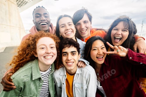 Preview: Multiracial young group of diverse friends standing together outside