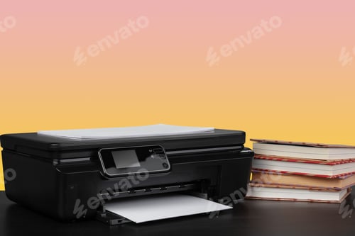 Preview: Compact home laser printer against yellow background