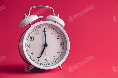 Preview: White alarm clock on Viva Magenta color background.
