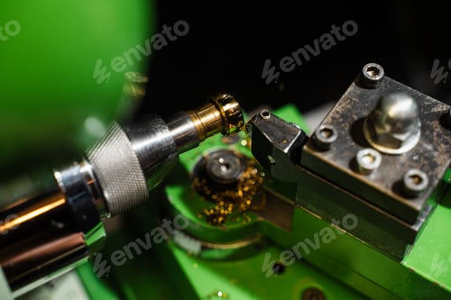 Preview: Gold ring being shaped by mechanical milling process.