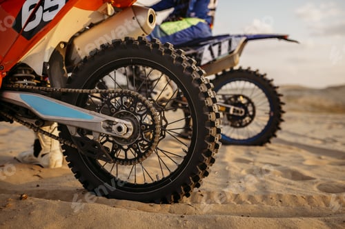Preview: MX rider on motorcycle view from back wheel