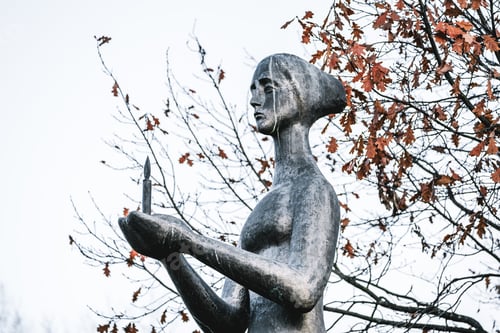 Preview: Bronze sculpture of mournful woman holding burning candle
