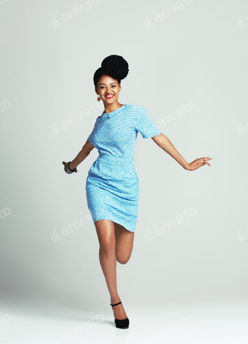 Preview: Live life being vintage and fabulous. Studio shot of a young woman wearing a vintage outfit.