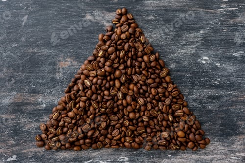 Preview: Top view of coffee beans in the form of triangle, pyramid.