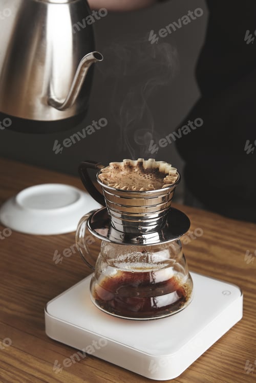 Preview: Close up of preparing filtered coffee in drip machine